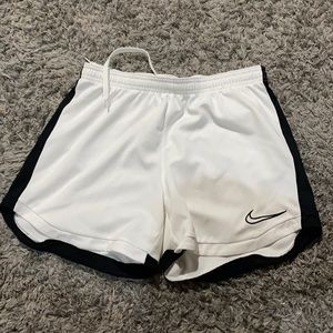 white nike shorts